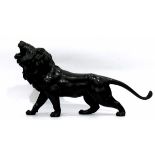 Japanese bronze model of a lion, marks to base,
