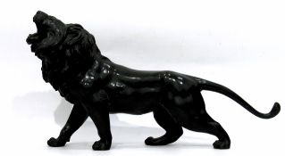 Japanese bronze model of a lion, marks to base,