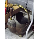 Brass metal coal scuttle with fitted coal shovel