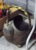 Brass metal coal scuttle with fitted coal shovel