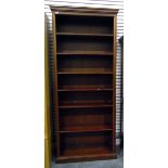 Mahogany open bookcase of six shelves, raised on a plinth base,