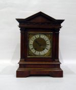 Victorian walnutwood mantel clock in architectural case, with brass dial, steel chapter ring,