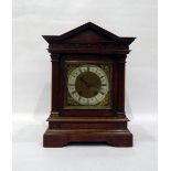 Victorian walnutwood mantel clock in architectural case, with brass dial, steel chapter ring,