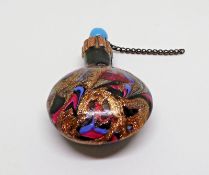 19th century scent bottle with circular turquoise stopper, gold, pink and blue swirl glass to body,