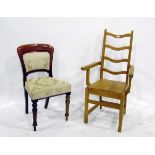 Victorian mahogany upholstered chair on turned supports and a 20th century pine carver (2)