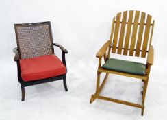 Cane-seated armchair and a teak rocker (2)