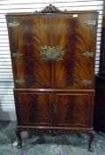 20th century cocktail cabinet in the Chinese style, with metal mounts and metal escutcheon,