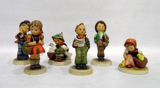 Six Goebel Hummel figures to include boy with rabbits, girl with basket,
