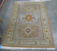 Eastern wool rug with three geometric hooked medallions to the field,