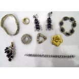 Quantity of costume jewellery to include beaded necklaces, bangles, rings, brooches,
