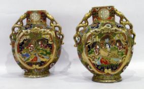 Pair of Japanese Satsuma earthenware disc vases,