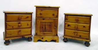 Pair of pine bedside chests with moulded edged top, three drawers, on bun feet,