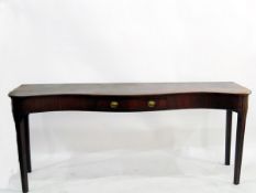 George III Irish mahogany serpentine serving table with frieze drawers, brass handles,