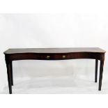 George III Irish mahogany serpentine serving table with frieze drawers, brass handles,