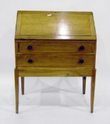 Modern walnut bureau with fitted interior, two long graduated drawers below,