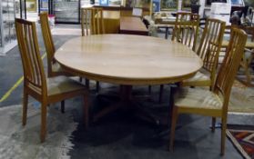 20th century pale oak extending dining table on pedestal support with splayed legs,