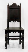 Pair of 17th century oak hall chairs with panelled back,
