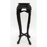 Chinese carved hardwood jardiniere stand with pink marble inset top,