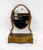 Georgian mahogany oval swing frame dressing table mirror,