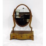 Georgian mahogany oval swing frame dressing table mirror,