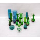 Quantity of green coloured glassware to include 20th century glass vases,