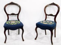 Pair of Victorian walnut dining chairs, hoop back, with foliate scroll top rail and cross rail,