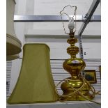 Gold metal standard lamp with cream shade