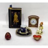 Royal Doulton ceramic mantel clock, Hummel figure, modern Faberge red glass egg,