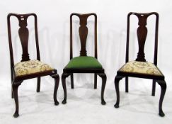 Set of three 20th century mahogany dining chairs with upholstered seats,