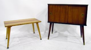 Mid-20th century rectangular record cabinet with sliding front cupboards, on tapering supports,
