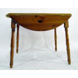 20th century pine drop-flap kitchen table, on turned supports,