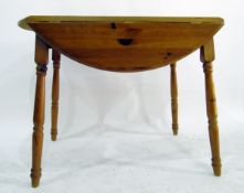 20th century pine drop-flap kitchen table, on turned supports,