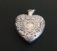 Silver rococo design heart-shaped scent/perfume bottle,