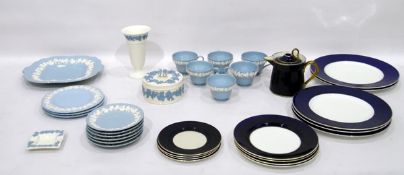Assorted Wedgwood embossed Queensware cups and saucers, blue and gilt plates,