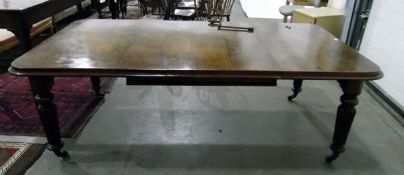 Victorian mahogany wind-out dining table, rectangular with curved corners, having three leaves,