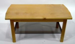 Pale wood rectangular-top coffee table with smoky glass shelf below, on square supports,