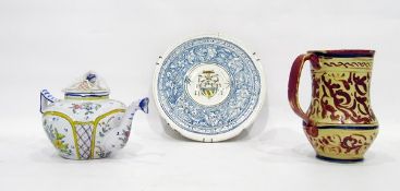 Antique armorial maiolica small charger, possibly Italian, with blue scroll border (damaged),