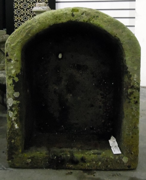 Old stone garden trough with arched end,