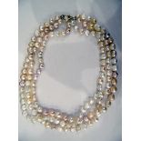 Three-strand champagne and cream baroque pearl necklace with gold coloured metal clasp, approx.