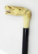 Ebonised wood walking stick with carved bone, fox's head handle,