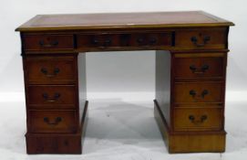 Yew wood veneer pedestal desk with inset leather writing surface,