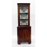 Georgian style mahogany glazed corner cupboard, the upper section enclosing two shelves,