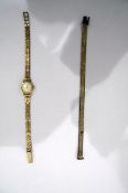 9ct gold lady's Longines wristwatch and another silver strap