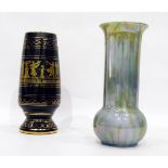 Ruskin vase of bottle form with flared rim, decorated in iridescent blue lustre glaze,