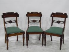 Six William IV style mahogany dining chairs with sabre backs,