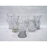 Five assorted cut glass and moulded glass vases and a cut glass jug with hobnail design (6)