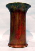 Large Ruskin vase of cylindrical form with flared rim, in an orange lustre glaze,