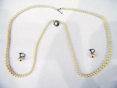 Cultured pearl graduated necklace on silver clasp and a pair of earrings