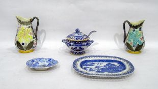 Early 19th century blue and white oval dish, the centre printed with the willow pattern,