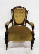 Late Victorian gent's carved walnutwood open arm drawing room chair with button upholstered back,